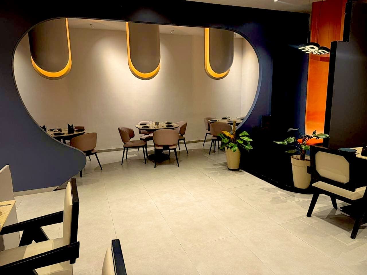 Arched, softly lit alcoves in the quieter seating area